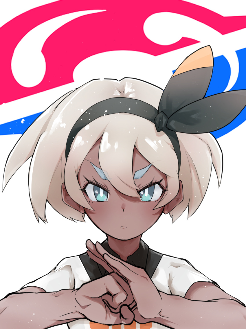 1girl absurdres bangs bea_(pokemon) black_hairband blonde_hair blush bow_hairband clenched_hand closed_mouth collared_shirt commentary_request dark_skin dark-skinned_female eyelashes gym_leader hair_between_eyes hairband hands_up highres looking_at_viewer necoski_2 pokemon pokemon_(game) pokemon_swsh print_shirt shirt short_hair short_sleeves solo