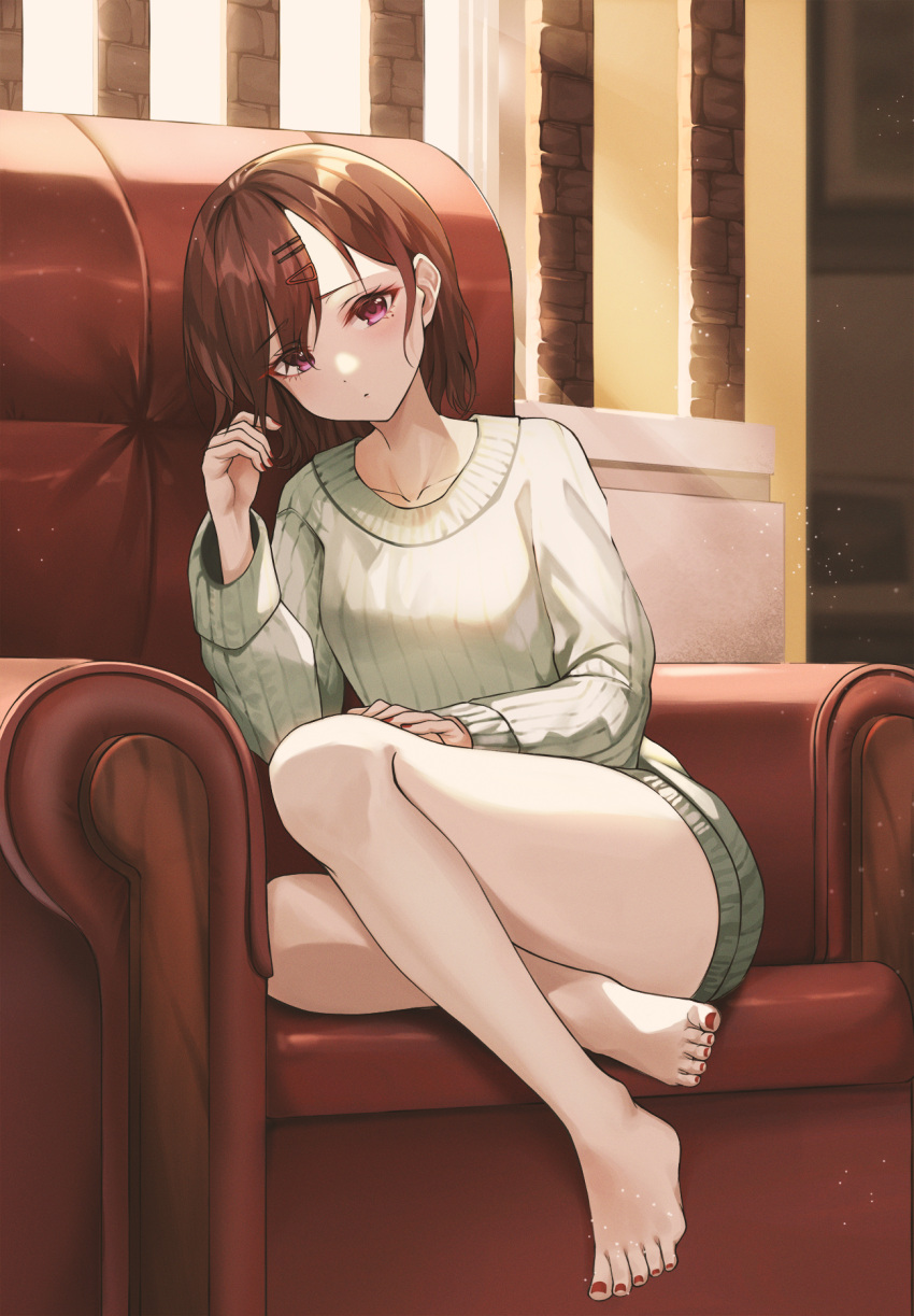 1girl armchair bangs barefoot brown_hair chair closed_mouth collarbone commentary_request hair_ornament hairclip hand_up highres higuchi_madoka idolmaster idolmaster_shiny_colors indoors junkt729 knees_up light_particles long_sleeves looking_at_viewer mole mole_under_eye nail_polish pink_eyes short_hair sitting solo sunlight sweater toenail_polish violet_eyes