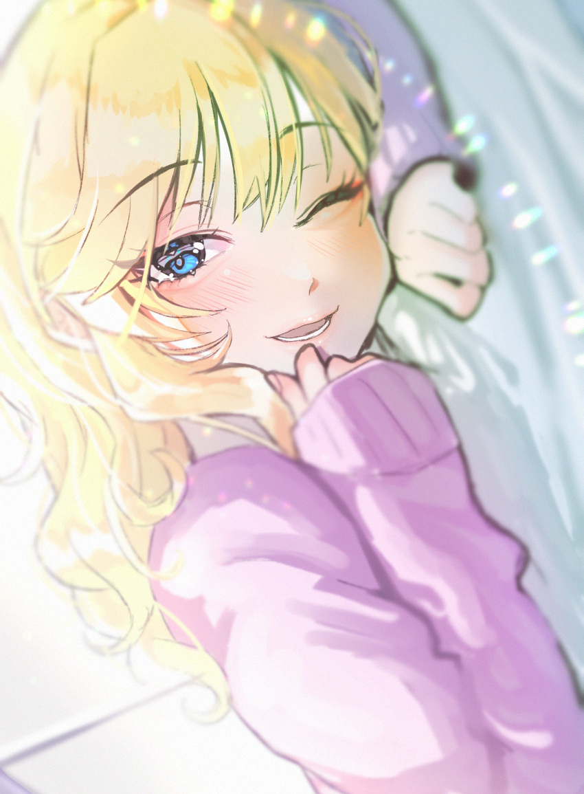 1girl bangs blonde_hair blue_eyes blurry blurry_foreground blush commentary_request depth_of_field eyebrows_visible_through_hair fujima_(k114) highres idolmaster idolmaster_cinderella_girls long_hair long_sleeves lower_teeth lying on_stomach one_eye_closed ootsuki_yui purple_sweater smile solo sweater upper_body