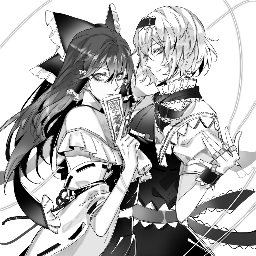 2girls alice_margatroid arm_ribbon ascot bangs bow capelet commentary_request cowboy_shot detached_sleeves dress earrings eyebrows_visible_through_hair frilled_ascot frilled_bow frilled_capelet frilled_hair_tubes frills from_side greyscale hair_between_eyes hair_bow hair_tubes hairband hakurei_reimu hand_up highres holding holding_paper jewelry kaoru_(alicemakoto) lolita_hairband long_hair looking_at_viewer monochrome multiple_girls multiple_rings nontraditional_miko ofuda paper puffy_short_sleeves puffy_sleeves ribbon ribbon-trimmed_sleeves ribbon_trim sash shirt short_hair short_sleeves sidelocks simple_background skirt sleeveless sleeveless_shirt smile string touhou white_background wide_sleeves yin_yang