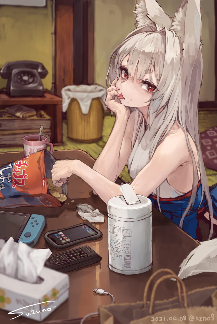 1girl :p animal_ear_fluff animal_ears artist_name bangs bare_arms bare_shoulders blurry blurry_foreground cellphone chips commentary controller cup dated eyebrows_visible_through_hair fingernails food food_on_face hand_on_own_cheek hand_on_own_face head_rest highres japanese_clothes kimono long_hair looking_at_viewer nail_polish nintendo_switch original phone pink_nails potato_chips red_eyes remote_control short_eyebrows sideways_glance signature sleeveless sleeveless_kimono smartphone solo suzuno_(bookshelf) symbol_commentary table thick_eyebrows tissue_box tongue tongue_out twitter_username used_tissue white_hair white_kimono