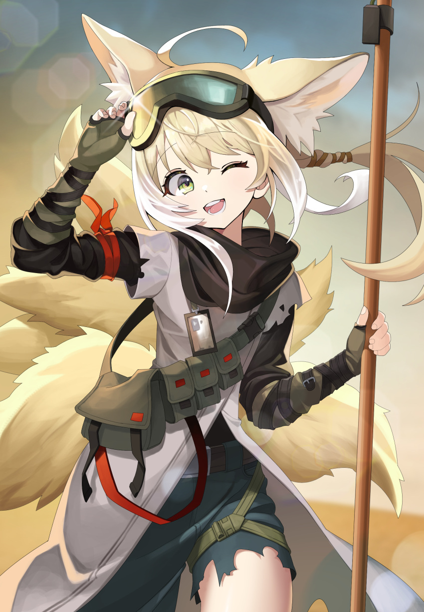 1girl :d absurdres adjusting_eyewear animal_ears arknights arm_ribbon arm_up asymmetrical_clothes black_gloves black_pants blonde_hair closed_mouth commentary_request cowboy_shot day desert dirty dirty_face eyewear_on_head fingerless_gloves floating_hair fox_ears fox_girl fox_tail gloves goggles goggles_on_head green_eyes highres holding holding_staff kanero kyuubi long_hair looking_at_viewer multiple_tails official_alternate_costume one_eye_closed open_mouth outdoors pants ponytail pouch red_ribbon ribbon single_pantsleg smile solo staff suzuran_(arknights) suzuran_(lostlands_flowering)_(arknights) tail teeth thigh_strap torn_clothes
