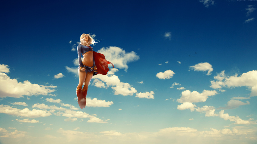 1girl belt blonde_hair blue_sky boots cape clouds dc_comics floating floating_hair highres midriff navel red_cape skirt sky solo supergirl tan tanline undressing