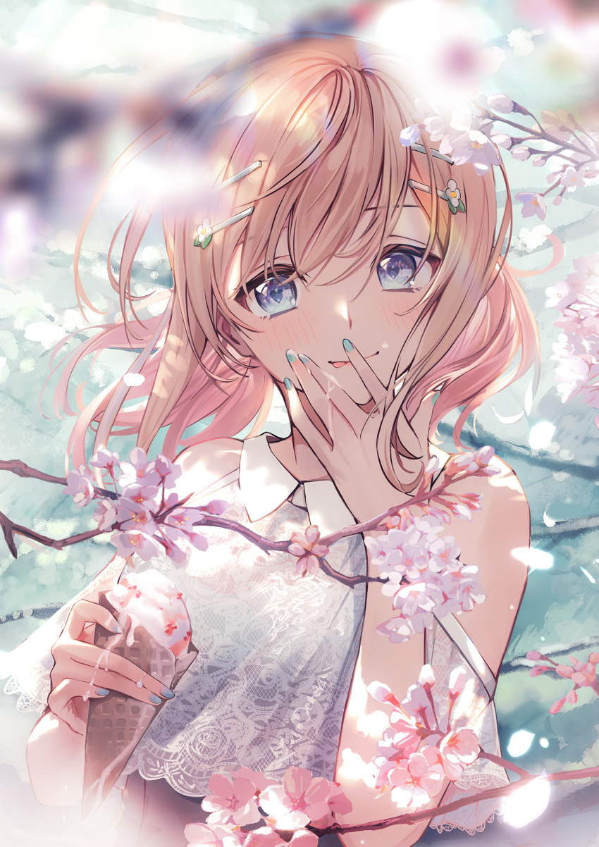 1girl bare_shoulders blonde_hair blue_eyes blurry blurry_foreground blush cherry_blossoms closed_mouth commentary_request duplicate finger_in_mouth flower food hair_ornament hairclip highres holding holding_food ice_cream_cone kagawa_ichigo looking_at_viewer medium_hair nail_polish original petals shirt smile solo tree tree_branch white_shirt