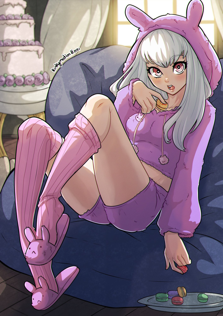 1girl alternate_costume artist_name breasts cake fire_emblem fire_emblem:_three_houses food highres hood hoodie kinkymation light_blush long_hair looking_at_viewer lysithea_von_ordelia macaron open_mouth pink_eyes shorts sitting slippers small_breasts solo sweets white_hair window