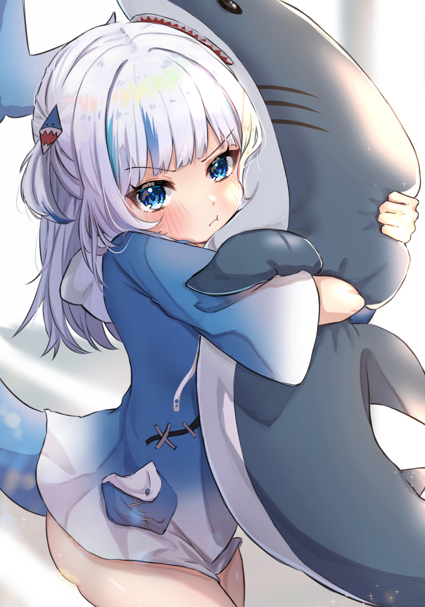 1girl :t amefukura_art animal_hood bangs blue_eyes blue_hair blue_hoodie blunt_bangs eyebrows_visible_through_hair fish_tail gawr_gura hair_ornament highres hololive hololive_english hood hoodie hug long_hair looking_at_viewer multicolored_hair pout shark shark_tail silver_hair simple_background solo streaked_hair stuffed_animal stuffed_toy tail two_side_up v-shaped_eyebrows virtual_youtuber