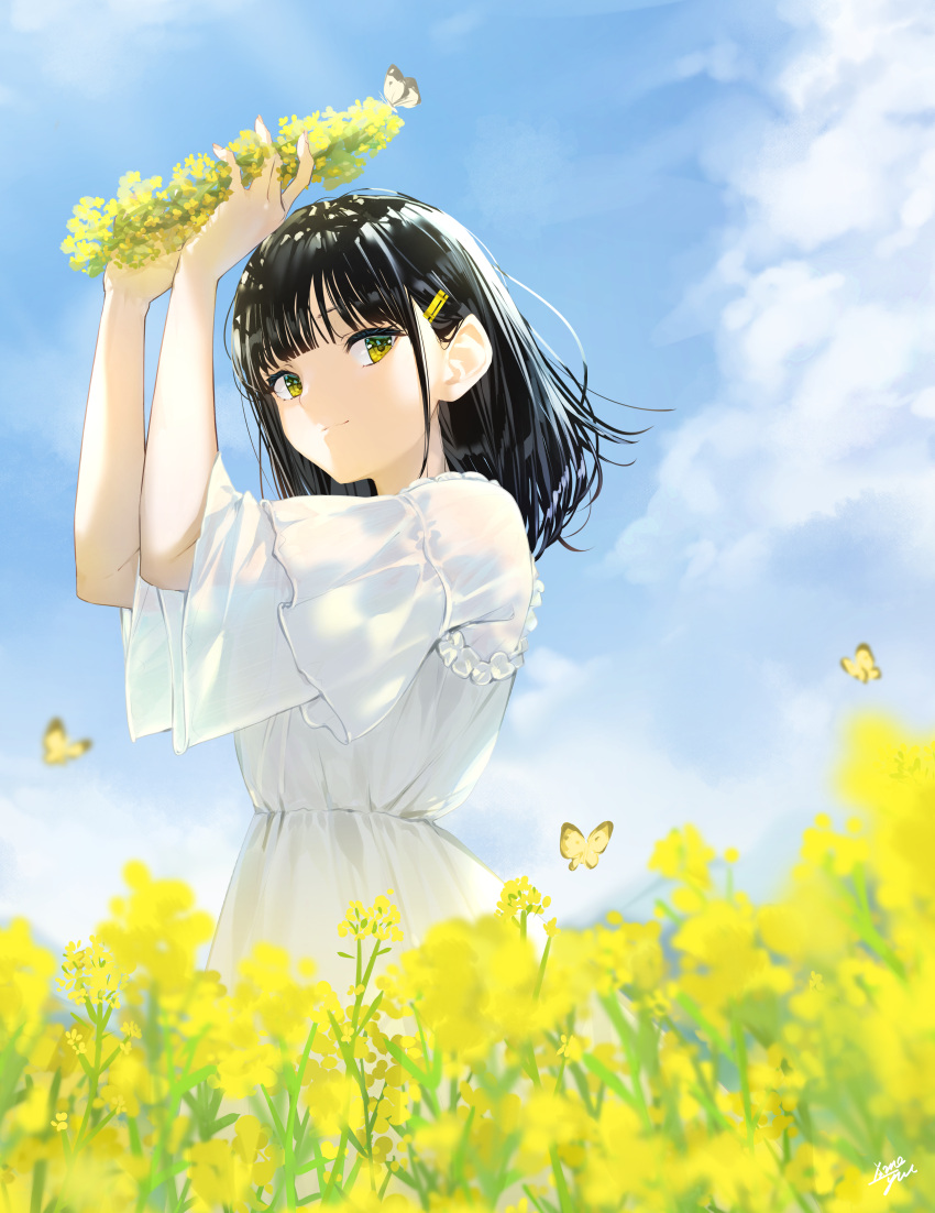 1girl absurdres animal arms_up bangs black_hair blue_sky bug butterfly closed_mouth clouds commentary_request day dress eyebrows_visible_through_hair flower flower_wreath green_eyes hair_ornament hairclip head_wreath highres holding huge_filesize insect looking_at_viewer original outdoors rapeseed_blossoms short_sleeves signature sky smile solo standing takenoko_no_you white_dress wide_sleeves yellow_flower