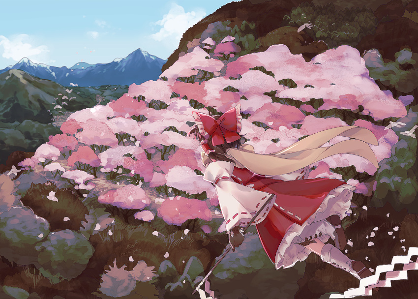 1girl bird boots bow brown_hair cherry_blossoms clouds day detached_sleeves facing_away flock flying frilled_hair_tubes frills gohei grey_scarf hair_tubes hakurei_reimu highres holding holding_stick koito_(bowstringsmall) landscape looking_afar medium_hair mountain mountainous_horizon outdoors petals petticoat red_bow red_skirt red_vest ribbon-trimmed_sleeves ribbon_trim scarf scenery sidelocks skirt sky solo stick touhou tree vest white_footwear wide_sleeves