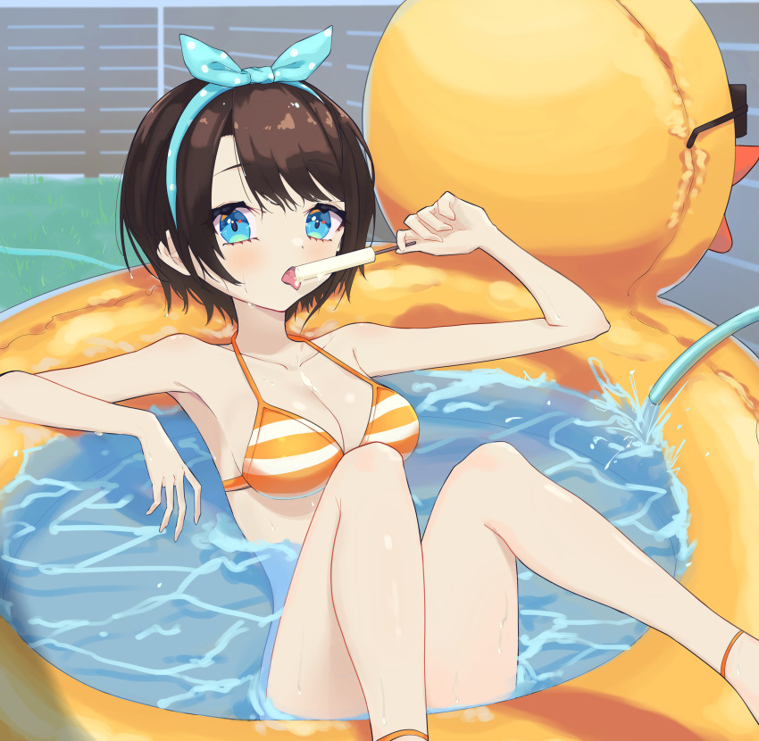 1girl absurdres ankle_strap bangs bare_arms bare_shoulders bikini blue_eyes blue_hairband bow_hairband brown_hair collarbone feet_out_of_frame food hairband highres hikap hololive licking lying melting on_back oozora_subaru popsicle short_hair solo striped striped_bikini swept_bangs swimsuit virtual_youtuber wading_pool yellow_bikini