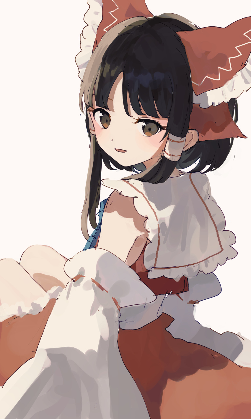1girl absurdres ascot bangs black_hair blue_ascot blush bow brown_eyes commentary_request detached_sleeves feet_out_of_frame from_behind grey_background hair_bow hair_tubes hakurei_reimu highres kozomezuki long_hair looking_at_viewer looking_back open_mouth red_bow red_skirt red_vest simple_background sitting skirt smile solo touhou vest white_sleeves