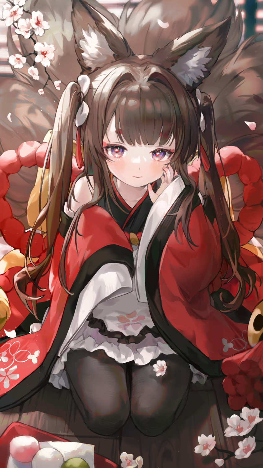 1girl absurdres amagi-chan_(azur_lane) animal_ears azur_lane bangs bare_shoulders bibimbub black_legwear blush brown_hair commentary dango eyebrows_visible_through_hair flower food fox_ears fox_girl fox_tail hand_on_own_cheek hand_on_own_face hand_up highres japanese_clothes kimono kyuubi long_hair long_sleeves looking_at_viewer multiple_tails off-shoulder_kimono pantyhose red_kimono rope seiza shimenawa short_eyebrows sitting sleeves_past_fingers sleeves_past_wrists smile solo symbol_commentary tail thick_eyebrows twintails violet_eyes wagashi white_flower wide_sleeves