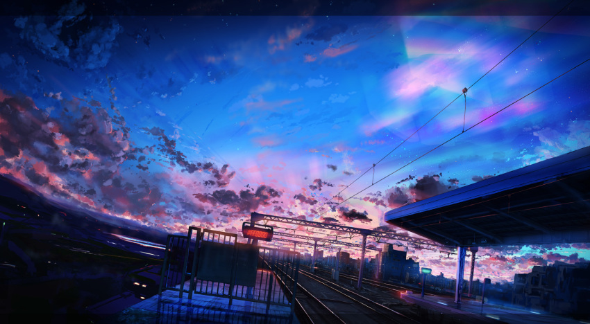 aurora building city cityscape clouds commentary_request dusk fence highres horizon kaminami_yoshitaka letterboxed mountainous_horizon night night_sky no_humans original outdoors overhead_line partial_commentary railroad_tracks scenery sign sky star_(sky) starry_sky train_station