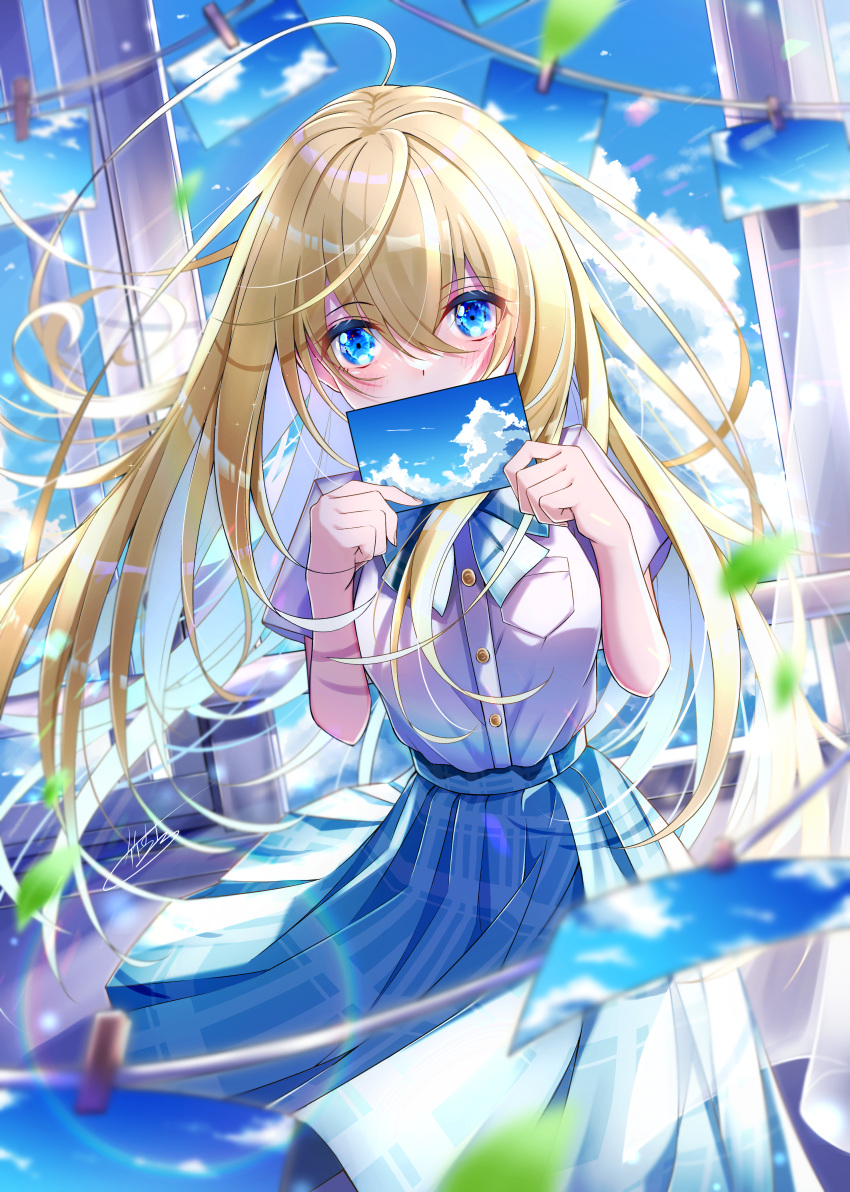 1girl absurdres ahoge bangs blonde_hair blue_bow blue_eyes blue_neckwear blue_skirt blush bow bowtie breasts commentary_request covering_mouth dress_shirt eyebrows_visible_through_hair hair_between_eyes highres holding holding_photo leaf long_hair looking_at_viewer medium_breasts medium_skirt original photo_(object) pleated_skirt shirt short_sleeves signature skirt solo takemura_kou very_long_hair white_shirt