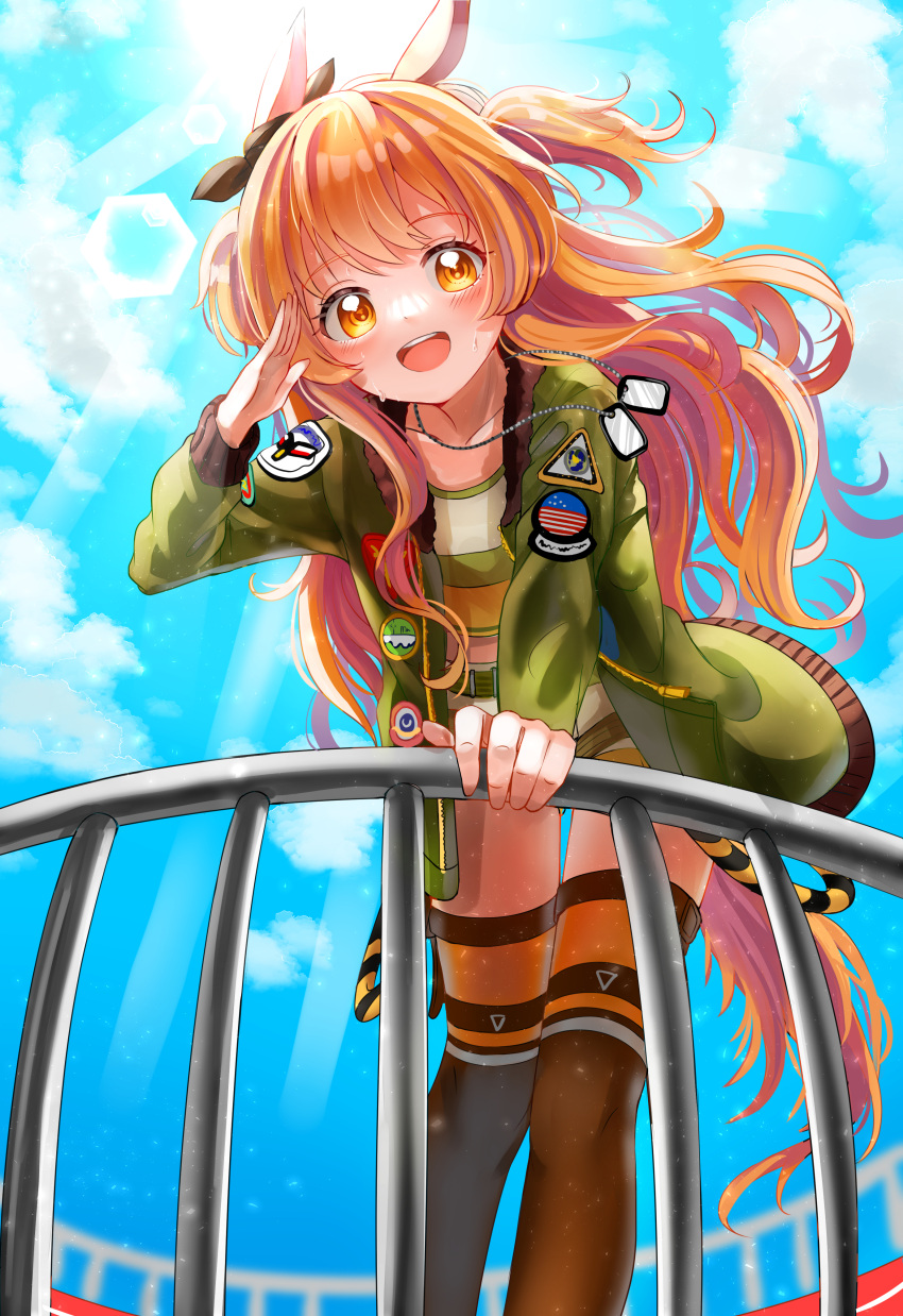 1girl :d absurdres animal_ears bangs blush brown_eyes brown_hair commentary crop_top day dog_tags feet_out_of_frame green_jacket highres horse_ears horse_girl horse_tail hya_ro jacket leaning_forward long_hair long_sleeves looking_at_viewer mayano_top_gun_(umamusume) open_mouth salute short_shorts shorts sky smile solo standing sweat tail thigh-highs twintails two_side_up umamusume upper_teeth