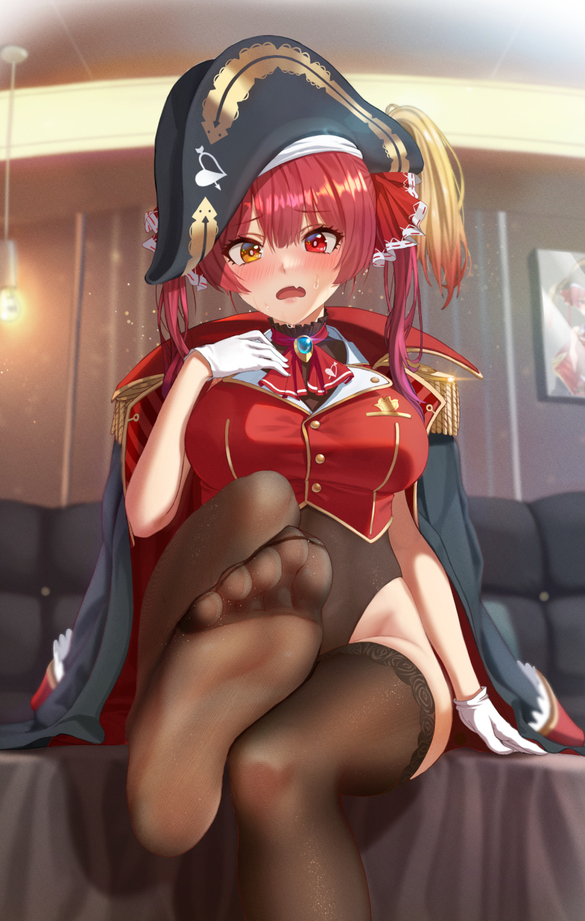 1girl ascot black_headwear blush breasts brown_legwear epaulettes fang gloves hat heterochromatic_tears highres hololive houshou_marine indoors k.pumpkin large_breasts looking_at_viewer no_shoes open_mouth pantyhose pirate_hat red_eyes red_neckwear redhead short_hair sitting skin_fang soles solo thighs twintails virtual_youtuber white_gloves yellow_eyes