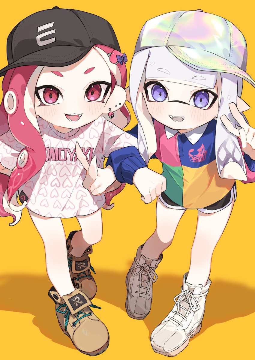 2girls :d asymmetrical_hair baseball_cap black_headwear black_shorts blue_shirt blunt_bangs blush boots bow brown_footwear clothes_writing collared_shirt colored_tongue commentary earrings fangs forehead green_shirt hair_bow hand_up hat heart heart_earrings heart_print highres ika_esu inkling inkling_girl jewelry light_purple_hair locked_arms long_hair long_sleeves looking_at_viewer multicolored_clothes multicolored_headwear multicolored_shirt multiple_earrings multiple_girls octoling octoling_girl open_mouth parted_bangs pink_eyes pink_hair pointy_ears polo_shirt purple_bow red_shirt shadow shirt short_eyebrows short_shorts shorts sidelocks simple_background smile splatoon_(series) standing stud_earrings suction_cups symbol-only_commentary teeth tentacle_hair tilted_headwear v v-shaped_eyebrows violet_eyes white_footwear white_shirt yellow_background yellow_shirt