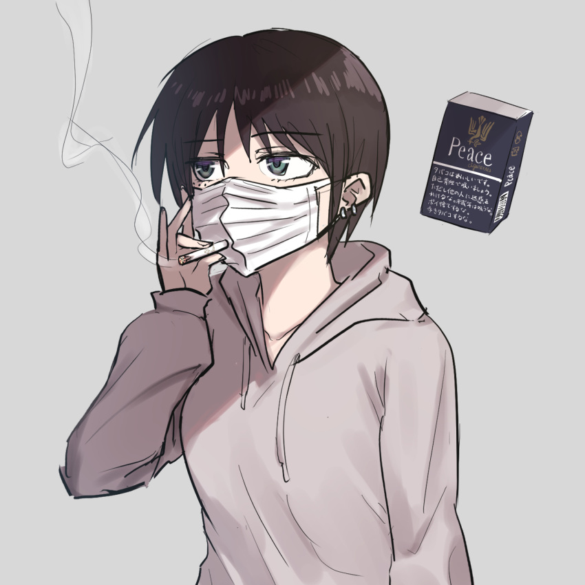 1girl arata_oribe cigarette cigarette_pack green_eyes grey_background grey_hoodie highres hood hood_down hoodie mask mouth_mask original piercing short_hair simple_background smoking standing upper_body