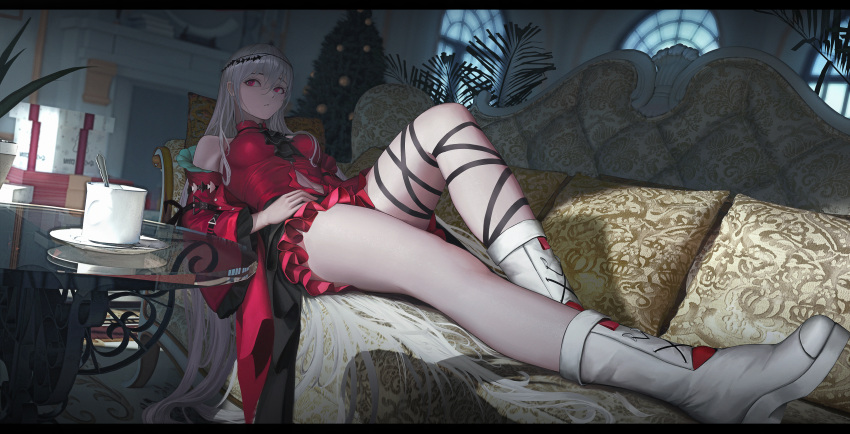 1girl absurdres arknights ascot bare_shoulders black_ascot black_ribbon boots breasts chinese_commentary christmas_present christmas_tree clothing_cutout commentary_request couch cup dress full_body gift hair_ornament hand_on_own_stomach highres indoors knee_up leg_ribbon letterboxed long_hair long_sleeves looking_away medium_breasts navel navel_cutout no_hat no_headwear official_alternate_costume on_couch parted_lips reclining red_dress red_eyes revision ribbon sideways_glance silver_hair sitting skadi_(arknights) skadi_the_corrupting_heart_(arknights) solo thighs white_footwear wide_sleeves zfivez