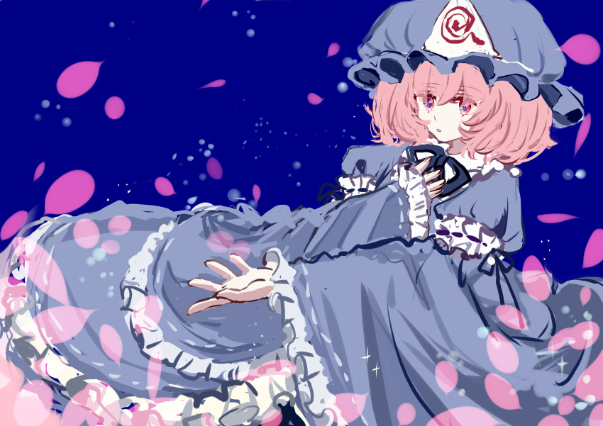1girl absurdres bangs black_neckwear blue_background blue_headwear blue_kimono blue_sleeves cherry_blossoms eyebrows_visible_through_hair hair_between_eyes hand_on_own_chest hand_up hat highres japanese_clothes kimono long_sleeves petals pink_eyes pink_hair saigyouji_yuyuko shocho_(shaojiujiu) short_hair simple_background solo touhou