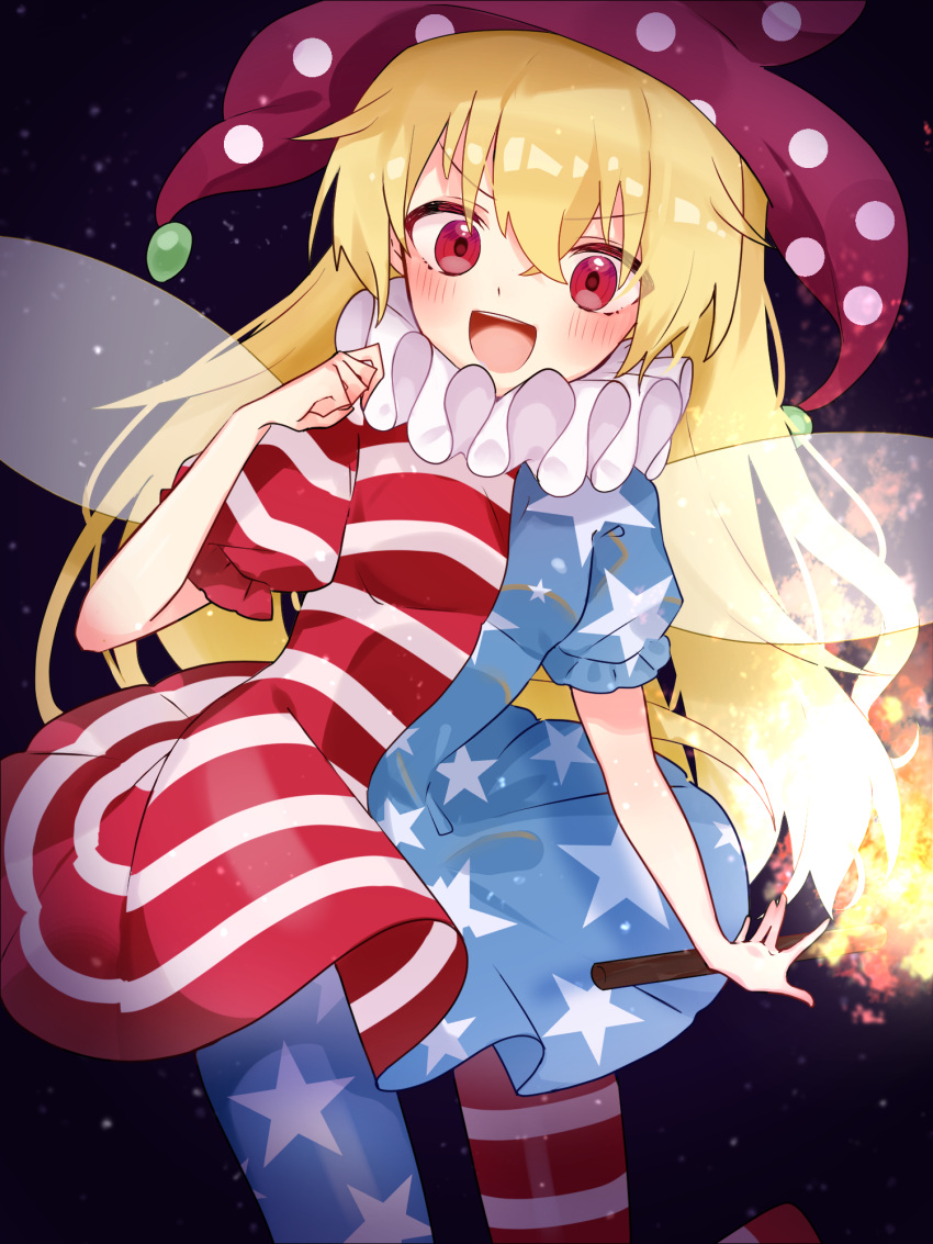 1girl american_flag_dress american_flag_legwear black_background blonde_hair blush clownpiece cowboy_shot dress fairy_wings fire hat highres holding jester_cap long_hair looking_at_viewer neck_ruff open_mouth pantyhose polka_dot purple_headwear red_eyes short_sleeves simple_background smile solo star_(symbol) star_print striped suikario torch touhou transparent_wings very_long_hair wings
