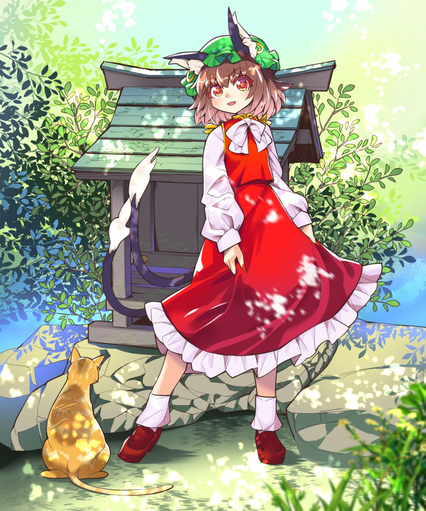 1girl :d animal_ear_fluff animal_ears blush bow bowtie brown_eyes brown_hair cat cat_ears cat_tail chen dappled_sunlight day dress full_body gold_trim hat highres jewelry mob_cap multiple_tails nekomata open_mouth outdoors red_dress short_hair single_earring smile solo standing sunlight tail touhou two_tails umigarasu_(kitsune1963) white_neckwear