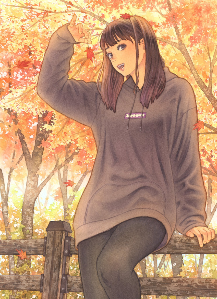 1girl autumn autumn_leaves black_legwear brown_hair falling_leaves fence forest highres hood hoodie leaf leggings long_hair looking_at_viewer makki_(tobaccos) maple_leaf nature original sitting_on_fence smile solo traditional_media tree wooden_fence