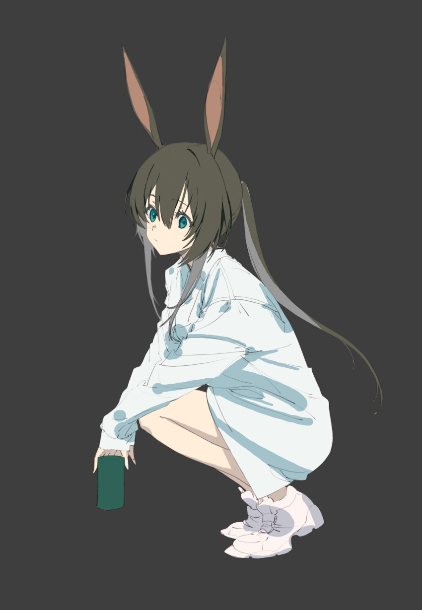 1girl absurdres amiya_(arknights) animal_ears arknights blue_eyes brown_background brown_hair full_body hair_between_eyes highres holding looking_at_viewer olys ponytail rabbit_ears shirt shoes short_hair_with_long_locks simple_background solo squatting white_footwear white_shirt
