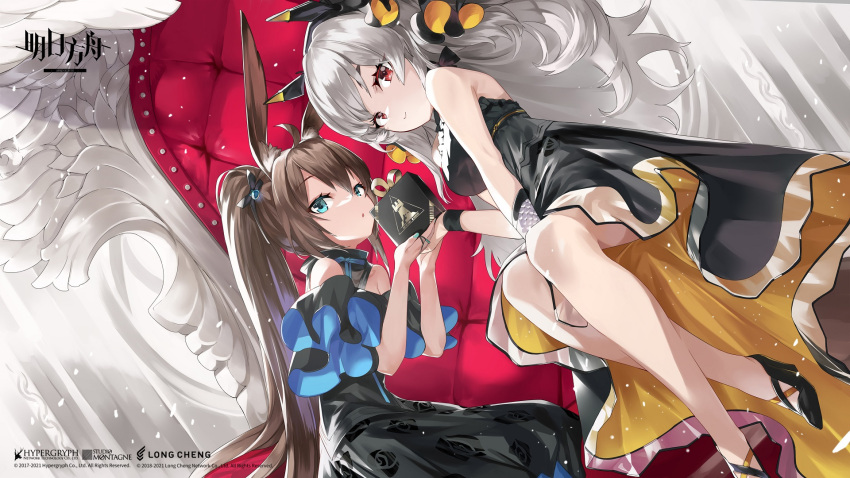 2girls ahoge amiya_(arknights) animal_ear_fluff animal_ears arknights black_bow black_dress black_footwear black_wristband blue_eyes bow breasts brown_hair chinese_commentary copyright_name dress dutch_angle floral_print frilled_dress frills hair_bow headgear high_heels highres holding long_hair looking_at_viewer medium_breasts multiple_girls off-shoulder_dress off_shoulder official_art ohland open_mouth ponytail rabbit_ears red_eyes rhodes_island_logo silver_hair sitting smile watermark weedy_(arknights) wristband