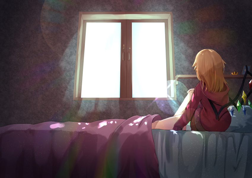 1girl alternate_costume alternate_hairstyle backlighting blanket blonde_hair bloom crystal facing_away flandre_scarlet highres hood hoodie indoors kaeremu knee_up lens_flare long_hair no_hat no_headwear on_bed red_hoodie red_sweater solo sweater touhou wall window wings