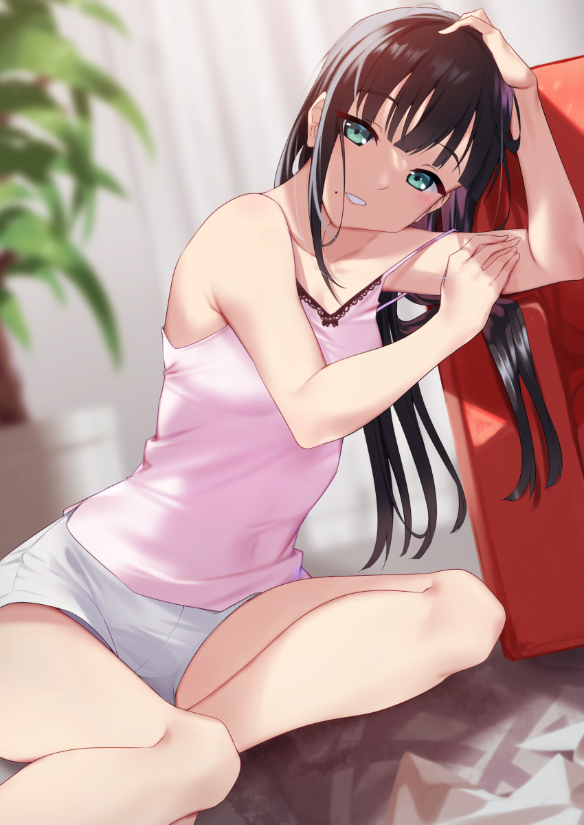 1girl :d absurdres arm_support bangs bare_legs black_hair blunt_bangs blush breasts camisole couch dutch_angle eyebrows_visible_through_hair green_eyes grey_shorts grin highres indoors kurosawa_dia long_hair looking_at_viewer love_live! love_live!_sunshine!! mole mole_under_mouth on_floor open_mouth shorts sitting sleeveless small_breasts smile solo strapless yamaori_(yamaorimon) yokozuwari
