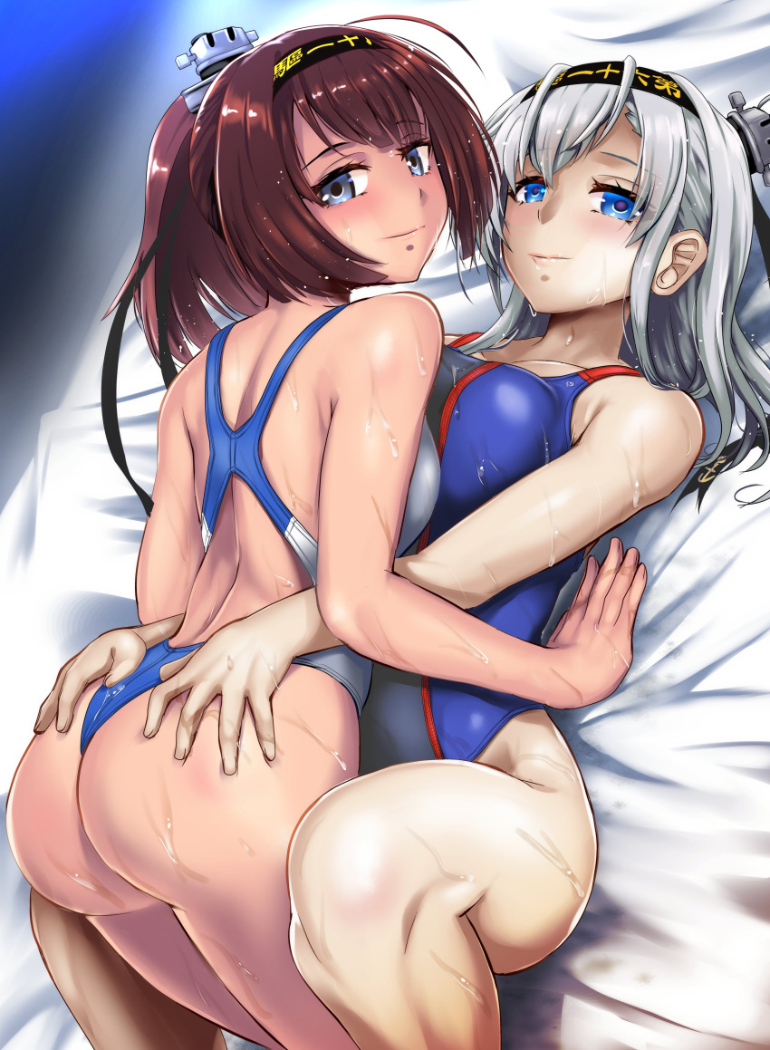 2girls absurdres ahoge akizuki_(kancolle) ass bed black_hair blue_swimsuit cape clothes_writing competition_swimsuit cowboy_shot grey_eyes hachimaki headband highres kantai_collection long_hair looking_at_viewer lying multiple_girls one-piece_swimsuit one-piece_thong one_side_up ponytail silver_hair suzutsuki_(kancolle) sweat swimsuit yellow_quokka yuri