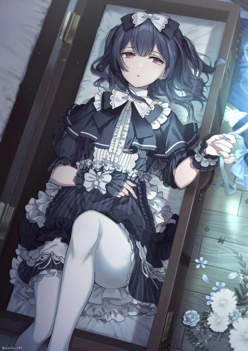 1girl bangs black_bow black_dress black_wrist_cuffs blue_dress bow commentary dark_blue_hair dress expressionless feet_out_of_frame floor flower frilled_dress frills gothic_lolita hair_between_eyes hair_bow hand_up highres holding holding_ribbon idolmaster idolmaster_shiny_colors indoors lolita_fashion looking_to_the_side lying morino_rinze on_back pantyhose parted_lips red_eyes ribbon short_hair short_sleeves solo suitcase takeko_spla wavy_hair white_bow white_flower white_legwear wrist_cuffs