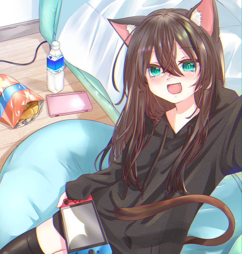 1girl :d absurdres animal_ear_fluff animal_ears aqua_eyes bag_of_chips black_hoodie black_legwear bottle cat_ears cat_girl cat_tail cellphone chips chromatic_aberration couch cushion fang food highres hood hood_down hoodie long_hair long_sleeves looking_at_viewer mizore_arius nintendo_switch no_pants open_mouth original phone potato_chips sitting sleeves_past_wrists slit_pupils smartphone smile tail