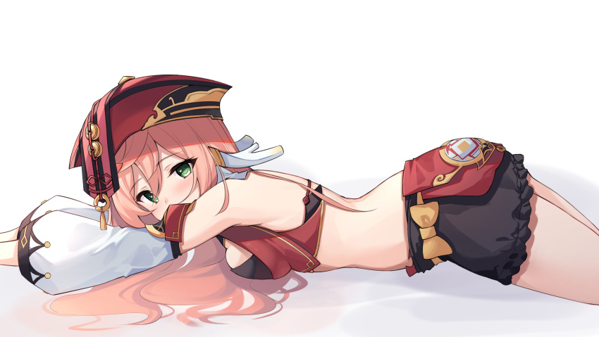 1girl absurdres armpits bare_shoulders black_shorts breasts covered_mouth crop_top detached_sleeves from_side genshin_impact gold_trim green_eyes hat highres horns long_hair looking_at_viewer looking_to_the_side lying medium_breasts midriff on_stomach pink_hair puffy_sleeves red_headwear revealing_clothes short_shorts shorts simple_background solo thighs white_background yanfei_(genshin_impact) z_loader