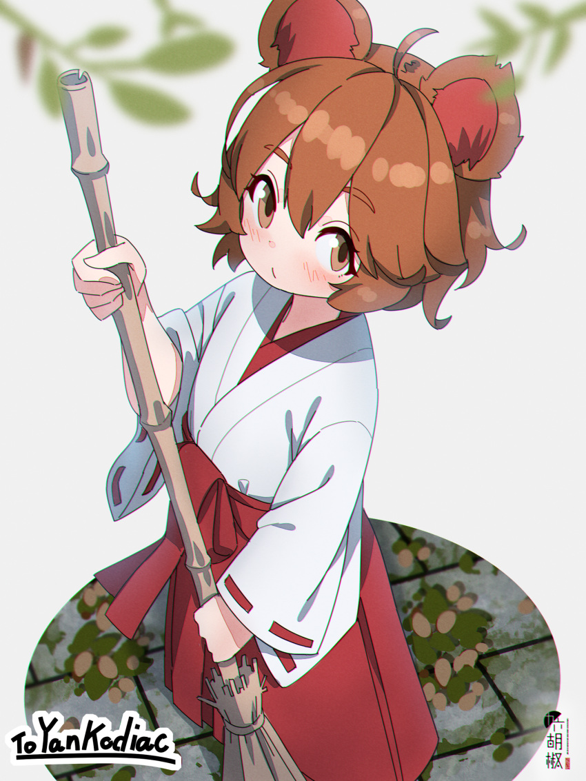 1girl ahoge animal_ears bamboo_broom bangs blush broom brown_eyes brown_hair closed_mouth commentary commission eyebrows_visible_through_hair hair_between_eyes hakama highres holding holding_broom japanese_clothes kimono kuro_kosyou looking_at_viewer miko original red_hakama short_hair skeb_commission solo standing thick_eyebrows white_kimono