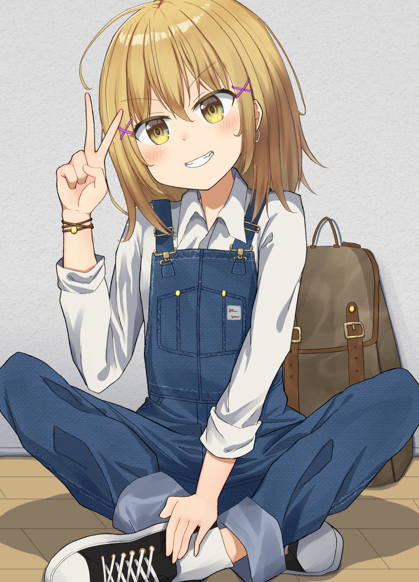 1girl absurdres blonde_hair denim eyebrows_visible_through_hair grey_background hair_between_eyes hair_ornament hairclip highres kuricona looking_at_viewer open_mouth original overalls shirt short_hair simple_background sitting smile solo victory_pose yellow_eyes