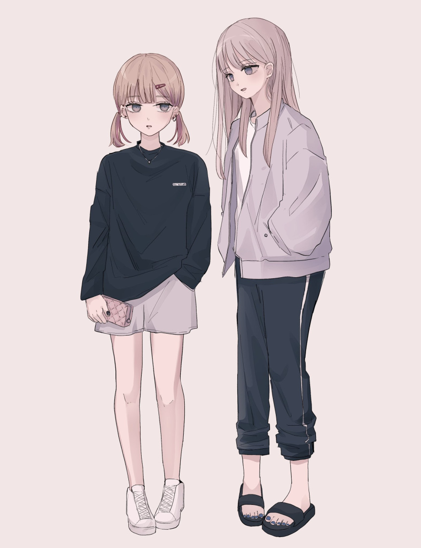 2girls :d bangs black_footwear black_pants black_shirt blue_nails brown_background brown_eyes brown_hair commentary_request eye_contact eyebrows_visible_through_hair grey_jacket grey_shorts hair_ornament hairclip hand_in_pocket highres holding jacket long_hair long_sleeves looking_at_another looking_to_the_side low_twintails multiple_girls open_clothes open_jacket open_mouth original pants puffy_long_sleeves puffy_sleeves sandals shirt shoes short_shorts short_twintails shorts simple_background smile standing toenail_polish tsuruse twintails white_footwear white_shirt