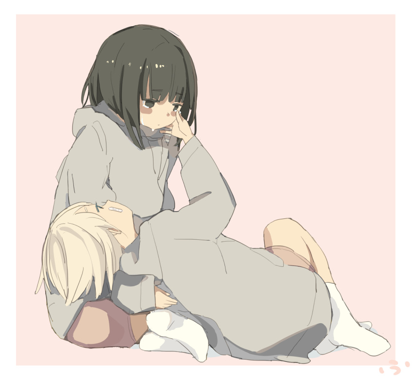 2girls bandaid black_hair highres hood hoodie lap_pillow multiple_girls original roisa short_hair simple_background tears white_hair wiping_tears yuri