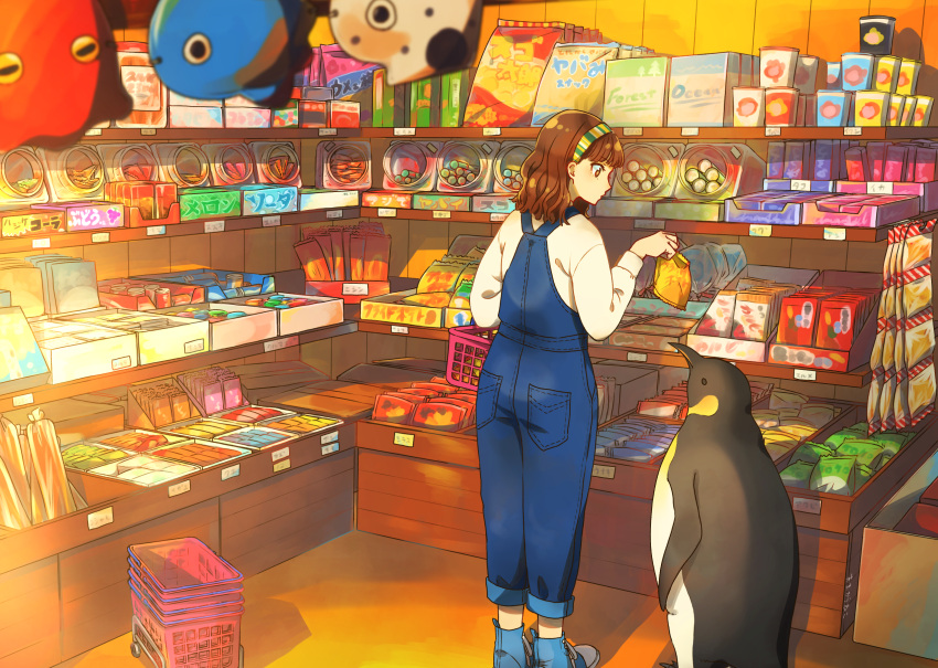 1girl bird blue_footwear blurry blurry_foreground brown_hair candy candy_store commentary_request emperor_penguin food from_behind hairband hand_up highres holding indoors long_sleeves looking_at_animal medium_hair original overalls penguin profile raito_(latek) shadow shoes shop shopping shopping_basket sneakers solo standing striped striped_hairband sunlight sweater white_sweater