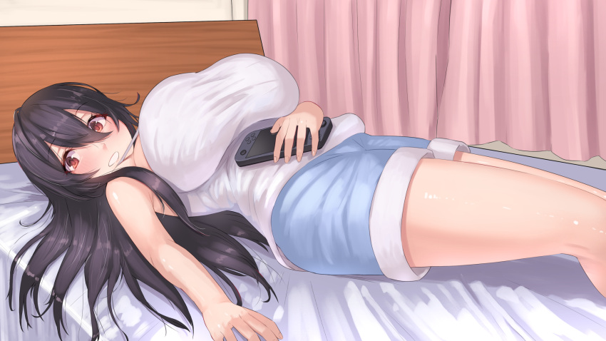 1girl black_hair breasts camisole game_console grin hair_between_eyes hair_spread_out handheld_game_console highres holding holding_handheld_game_console huge_breasts lying natsuishi_nana nintendo_switch_lite on_back on_bed orange_eyes original shorts smile solo taut_clothes