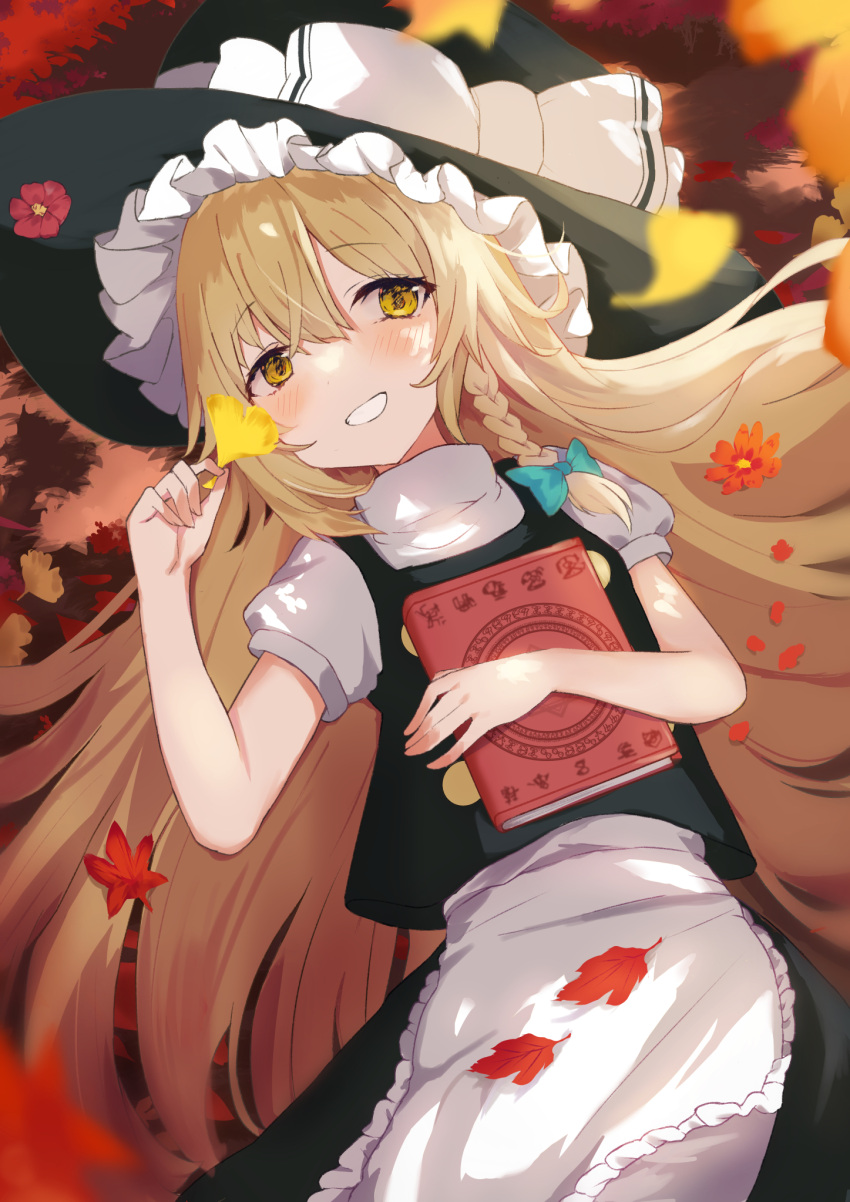 1girl apron aqua_bow autumn_leaves bangs black_dress black_headwear blonde_hair blue_bow blush book bow braid buttons closed_mouth dress eyebrows_visible_through_hair frills ginkgo green_bow hair_between_eyes hair_bow hat hat_bow highres kirisame_marisa kogalashi leaf long_hair looking_to_the_side lying maple_leaf puffy_short_sleeves puffy_sleeves shirt short_sleeves single_braid smile solo teeth touhou white_apron white_bow white_shirt witch_hat yellow_eyes