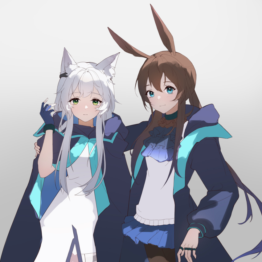 2girls amiya_(arknights) animal_ear_fluff animal_ears arknights bangs blue_eyes blush brown_hair cat_ears cat_girl cloak closed_mouth cravat dress fingerless_gloves gloves green_eyes hand_on_another's_shoulder highres hood hooded_cloak hooded_jacket infection_monitor_(arknights) jacket jewelry long_hair multiple_girls ponytail rabbit_ears rabbit_girl ring rosmontis_(arknights) shenshanwanwan silver_hair skirt white_dress