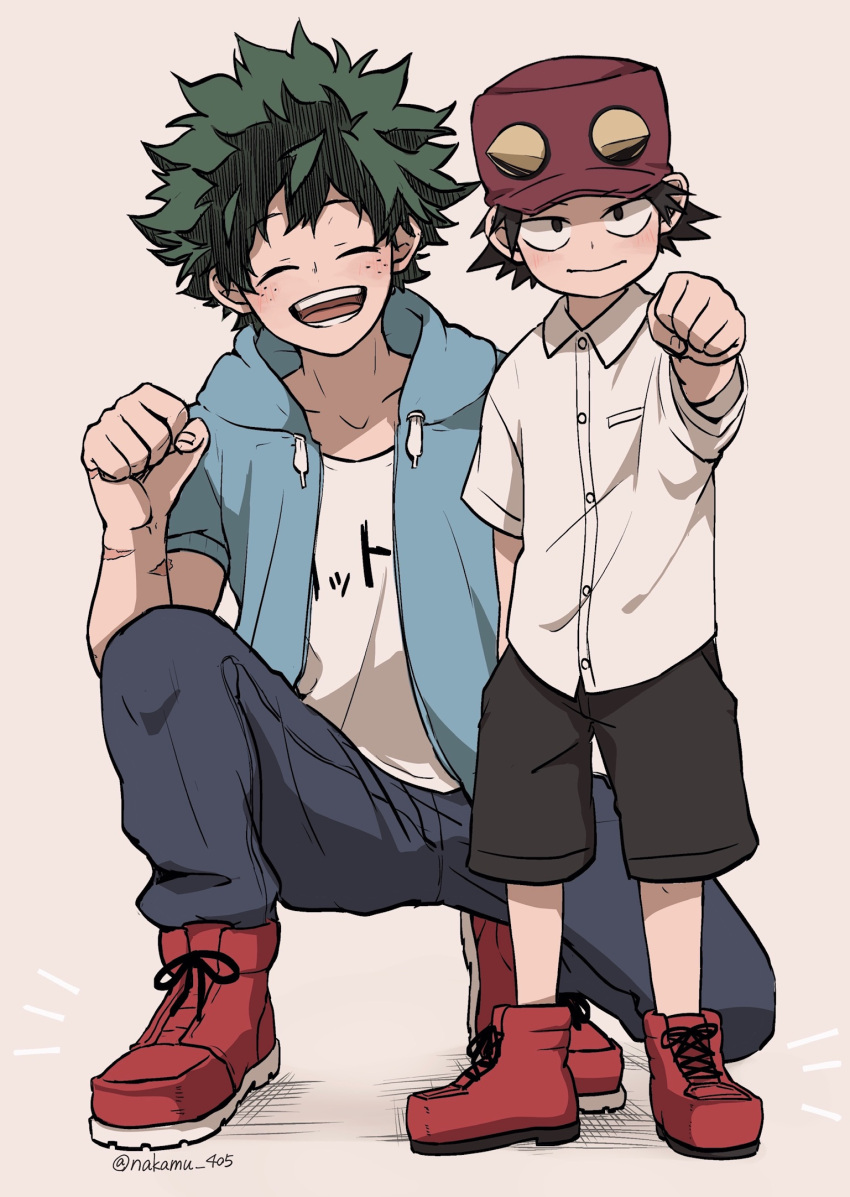 2boys alternate_costume bangs baseball_cap black_pants black_shorts blush boku_no_hero_academia boots breast_pocket breasts clenched_hand closed_eyes clothes_writing collarbone collared_shirt commentary_request dress_shirt facing_viewer freckles green_jacket grey_background hat highres hood hood_down hooded_jacket izumi_kouta jacket male_focus midoriya_izuku multiple_boys nakamu_405 open_mouth pants pocket red_footwear red_headwear scar_on_arm shirt shoes short_shorts short_sleeves shorts skirt smile sneakers squatting white_shirt