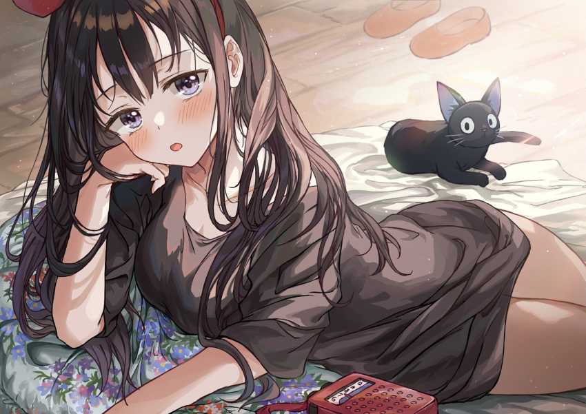 1girl :o animal bangs black_cat black_dress black_hair black_hairband blush breasts cat collarbone commentary_request cowboy_shot dress eyebrows_visible_through_hair hairband hand_on_own_cheek hand_on_own_face hand_up head_rest jiji_(majo_no_takkyuubin) kiki light_particles long_hair looking_at_viewer lying majo_no_takkyuubin on_side radio saya_(mychristian2) shoes_removed short_sleeves solo violet_eyes