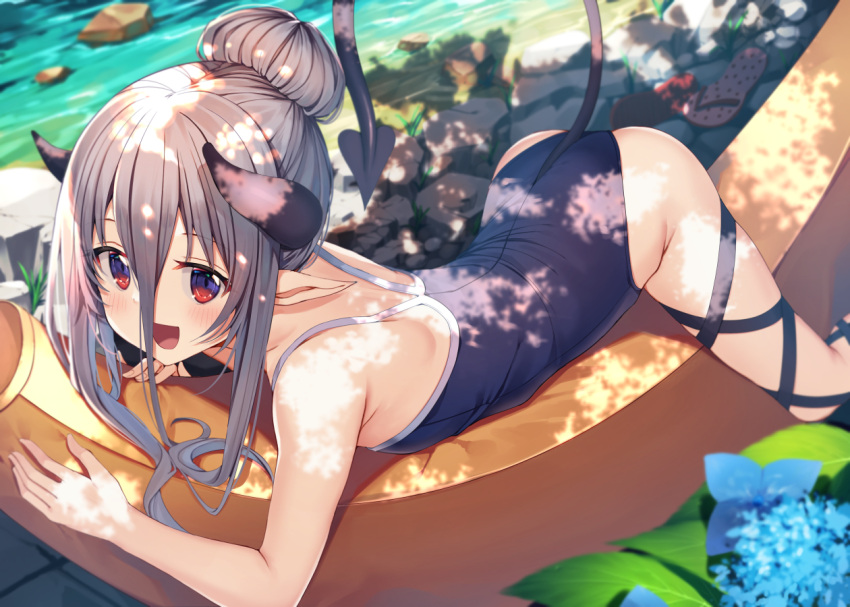 1girl :d ass bangs bare_arms bare_shoulders black_swimsuit blue_flower blurry blurry_background commentary_request curled_horns day demon_girl demon_horns demon_tail depth_of_field eyebrows_visible_through_hair feet_out_of_frame flower grey_hair gurasion_(gurasion) hair_between_eyes hair_bun horns long_hair looking_at_viewer lying on_stomach one-piece_swimsuit open_mouth original outdoors red_eyes sandals_removed smile solo swimsuit tail water white_footwear