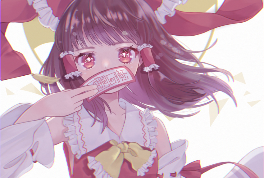 1girl armpit_peek backlighting bangs bare_shoulders bloom blunt_bangs bow brown_hair chromatic_aberration collarbone commentary_request covered_mouth detached_sleeves floating_hair frilled_bow frilled_hair_tubes frilled_neckwear frilled_shirt_collar frills hair_bow hair_tubes hakurei_reimu highres holding holding_paper lens_flare long_hair long_sleeves looking_at_viewer ofuda paper red_bow red_eyes red_vest sidelocks simple_background solo tassel touhou upper_body vest wata_meuko white_background wind yin_yang yin_yang_print