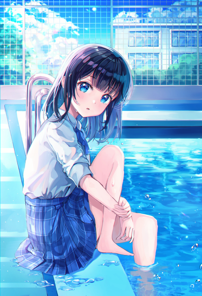 1girl :o bad_feet bangs bare_legs barefoot black_hair blue_eyes blue_neckwear blue_skirt blue_sky blush bow bowtie building clouds commentary fence foot_out_of_frame highres knee_up looking_at_viewer open_mouth original outdoors plaid plaid_skirt pleated_skirt pool pool_ladder shirt short_hair sidelocks skirt sky sleeves_rolled_up soaking_feet solo ssum_(ehf_dustk) symbol_commentary tree water water_drop white_shirt