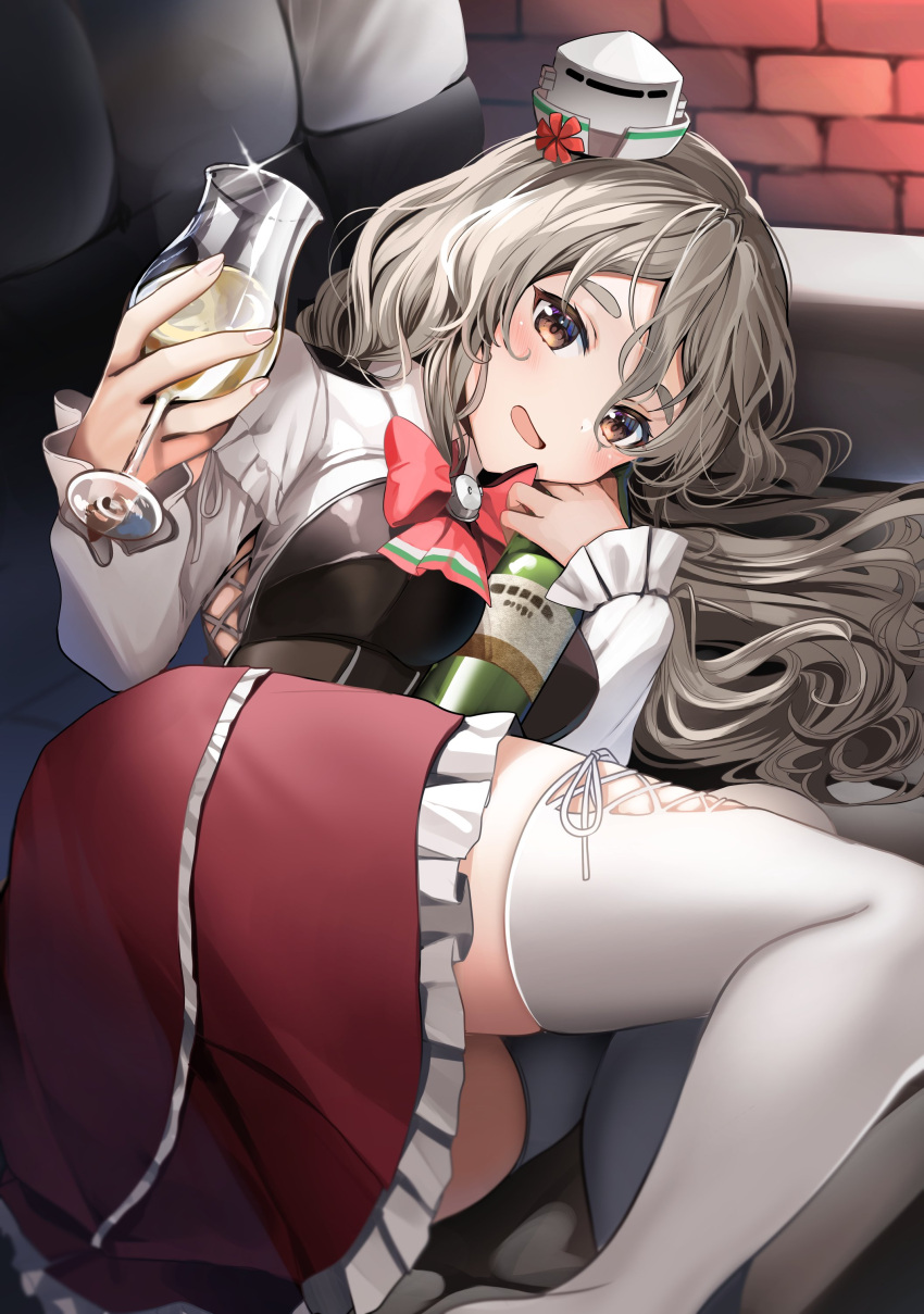 1girl absurdres bottle bow bowtie breasts brown_eyes couch cup drinking_glass frilled_skirt frills grey_hair hat highres holding holding_bottle holding_cup indoors kantai_collection lying medium_breasts mini_hat miniskirt on_couch on_side pola_(kancolle) red_neckwear red_skirt shirt skirt solo thigh-highs tilted_headwear wavy_hair white_legwear white_shirt wine_bottle wine_glass yunamaro