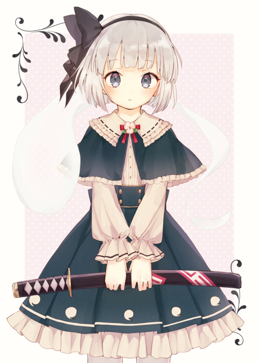 1girl adapted_costume bangs black_hairband black_ribbon blue_eyes capelet cowboy_shot flower green_capelet green_skirt grey_hair hair_ribbon hairband highres holding holding_sword holding_weapon honotai katana konpaku_youmu konpaku_youmu_(ghost) long_sleeves looking_at_viewer neck_ribbon pink_background polka_dot polka_dot_background red_neckwear ribbon shirt short_hair skirt solo sword touhou weapon white_shirt