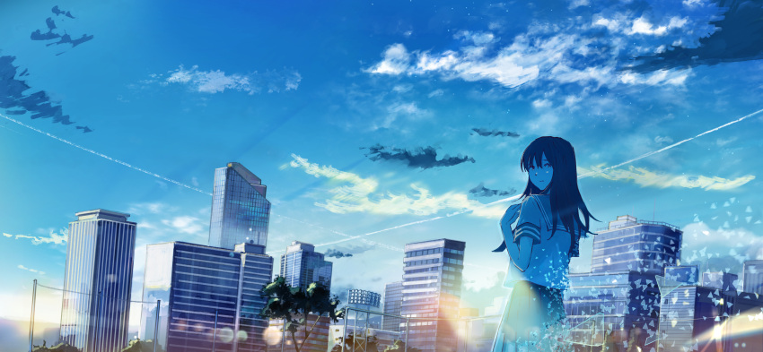 1girl absurdres bangs blue_skirt blue_sky building clouds condensation_trail hand_up highres lens_flare long_hair looking_back sakura_inu_(itoyatomo) scenery school_uniform serafuku short_sleeves skirt sky skyscraper standing tree